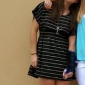 A line button/open back dress